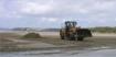 Nettoyage de plage lors de la basse mer